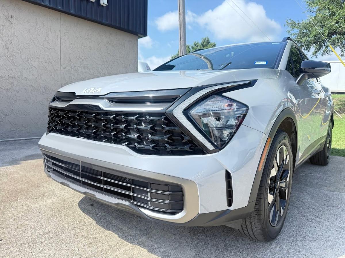 Front-end collision repair for a The Colony TX customer — hood, grille, and frame straightened at DG Collision Center